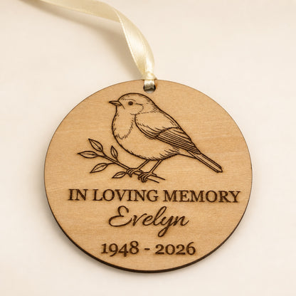 Personalised round birch robin memorial ornament engraved with Evelyn and 1948 - 2026