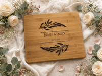 AI-styled supplementary wedding scene with ivory flowers around the personalised bamboo chopping board