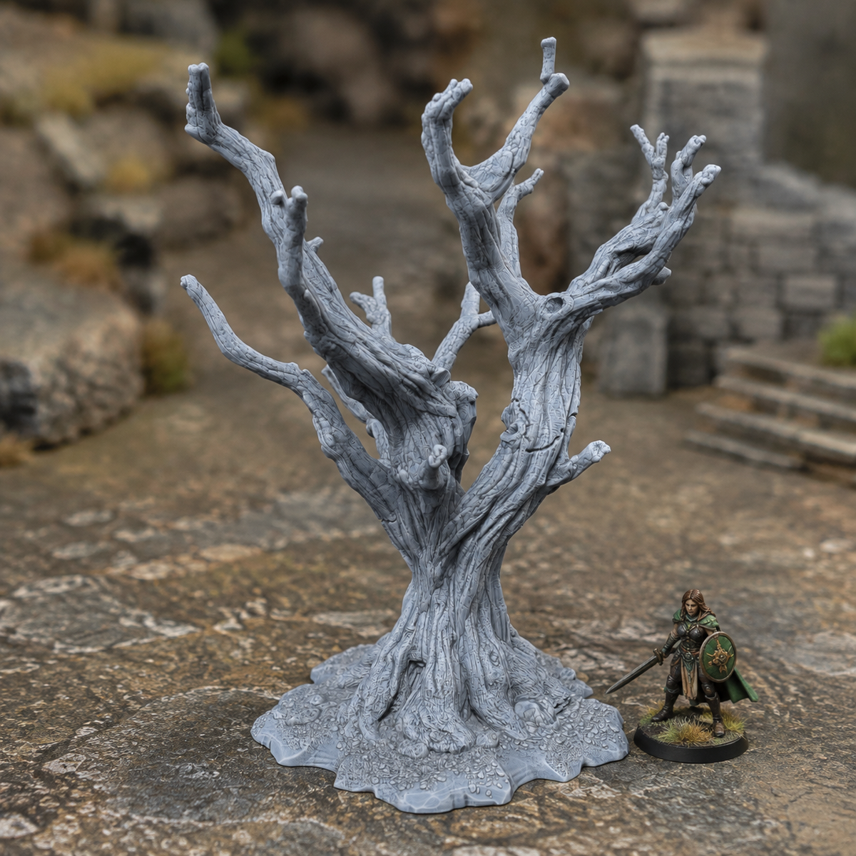 Free Tree - Forgotten Towns unpainted grey 28mm terrain in a medieval tabletop scene