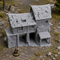 Harlan Grey-Eye's Barn unpainted grey 28mm terrain in a medieval tabletop scene