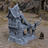 House of Whispers unpainted grey 28mm terrain in a medieval tabletop scene