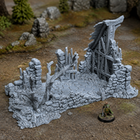 Ruined Shack unpainted grey 28mm terrain in a medieval tabletop scene
