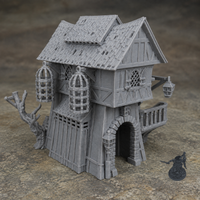 Jail House 28mm terrain with dark grey miniature for scale