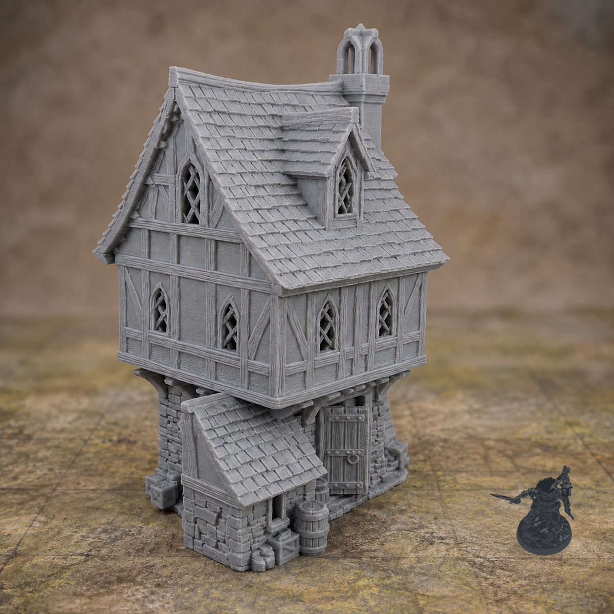 Vinesdale House 28mm terrain with dark grey miniature for scale