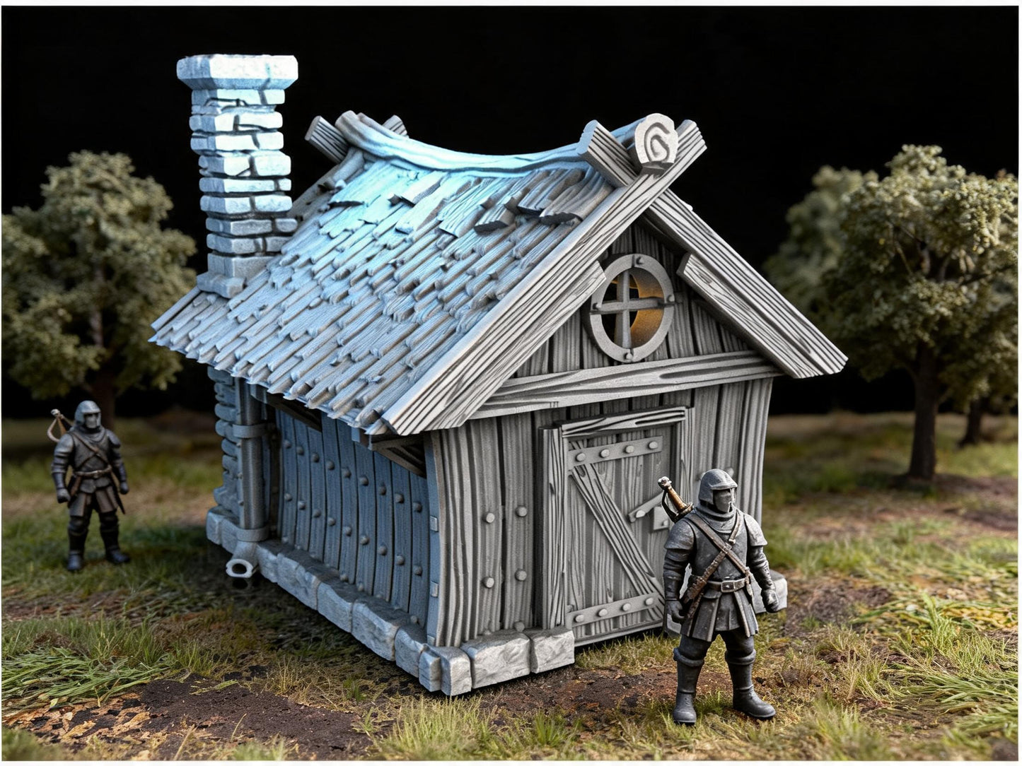Unpainted Hunters Cabin 28mm terrain with scale miniatures shown for context; miniatures not included