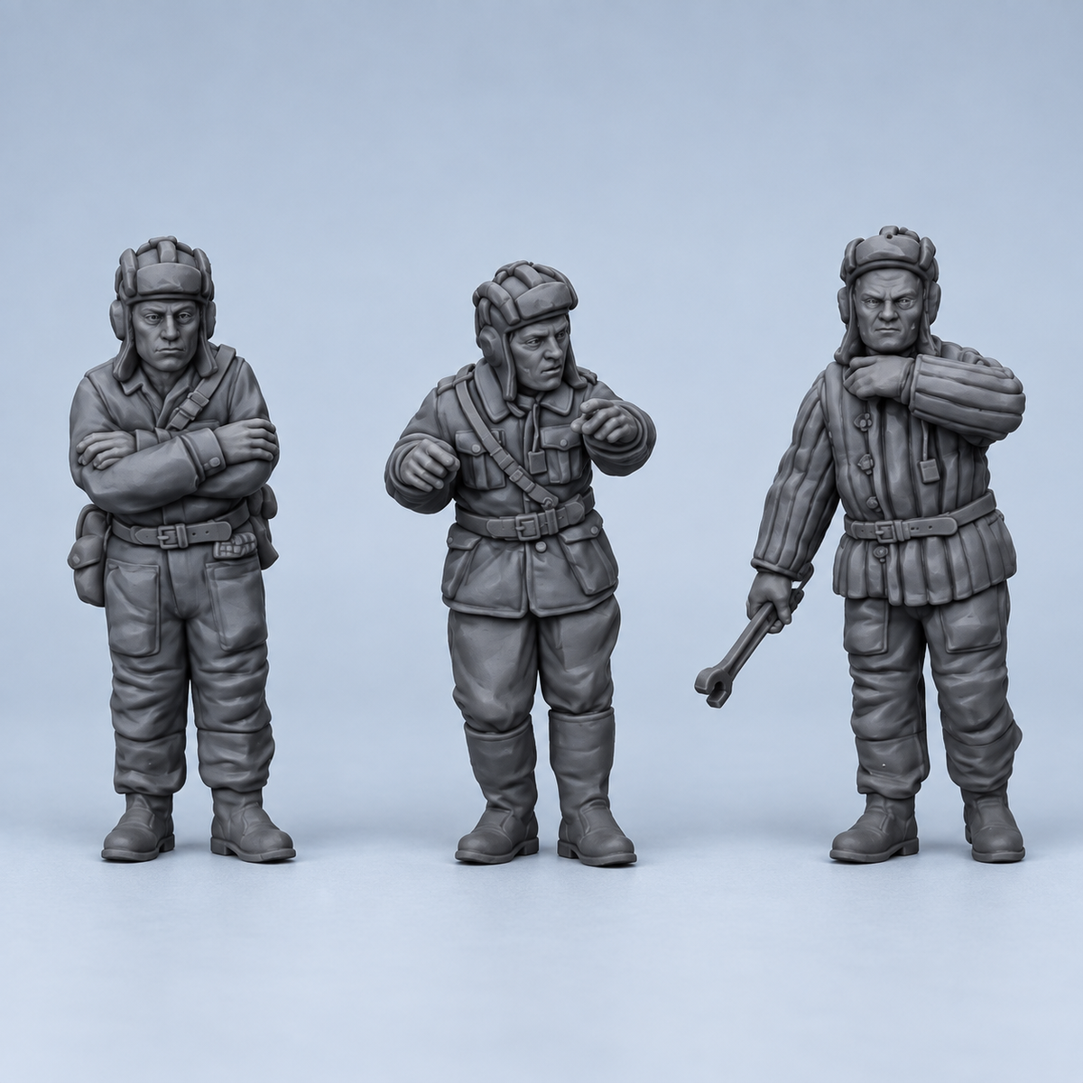 Rubble March Crew three unpainted resin crew miniatures, clean grey identity image.