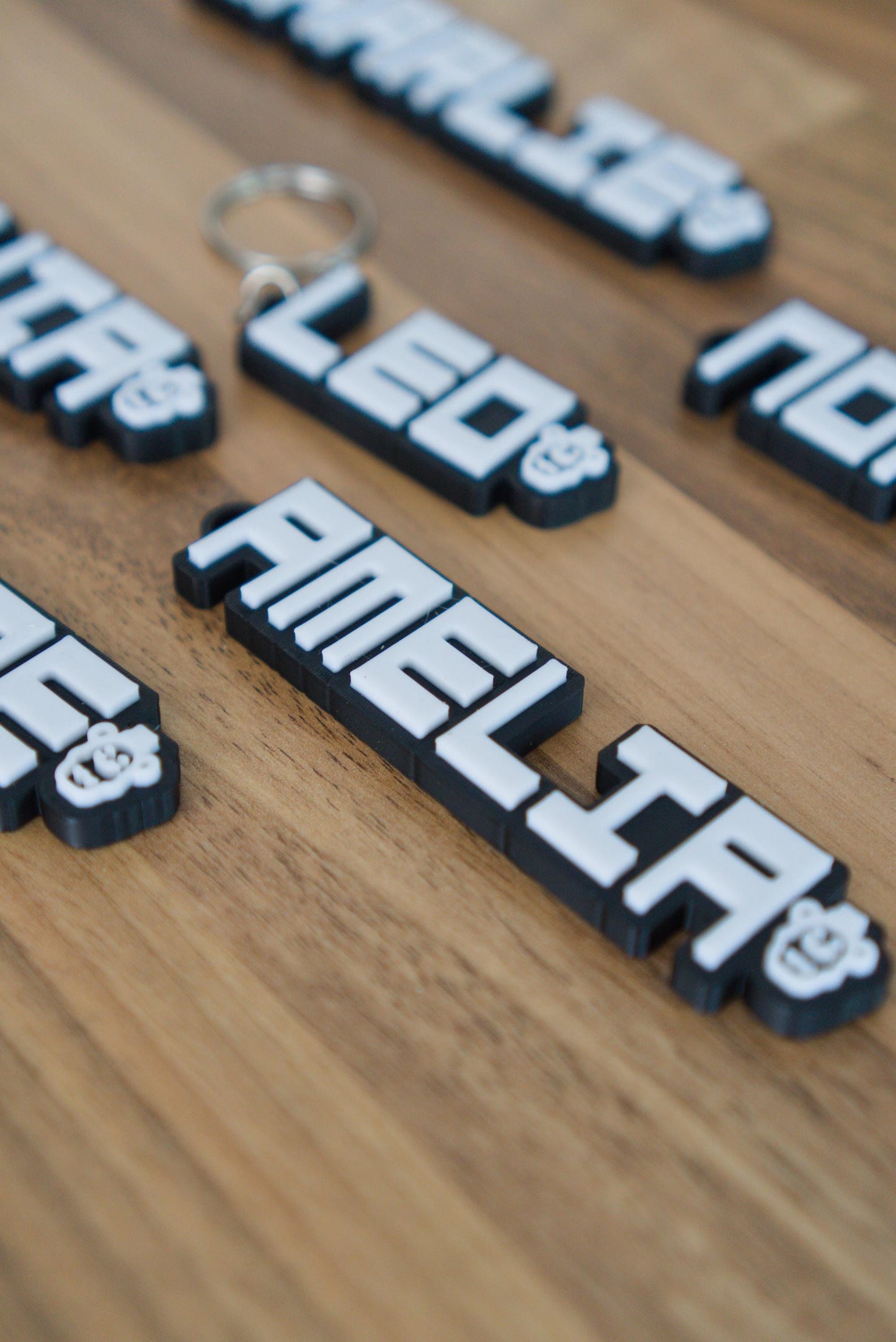 FNAF custom name keychain on wooden background