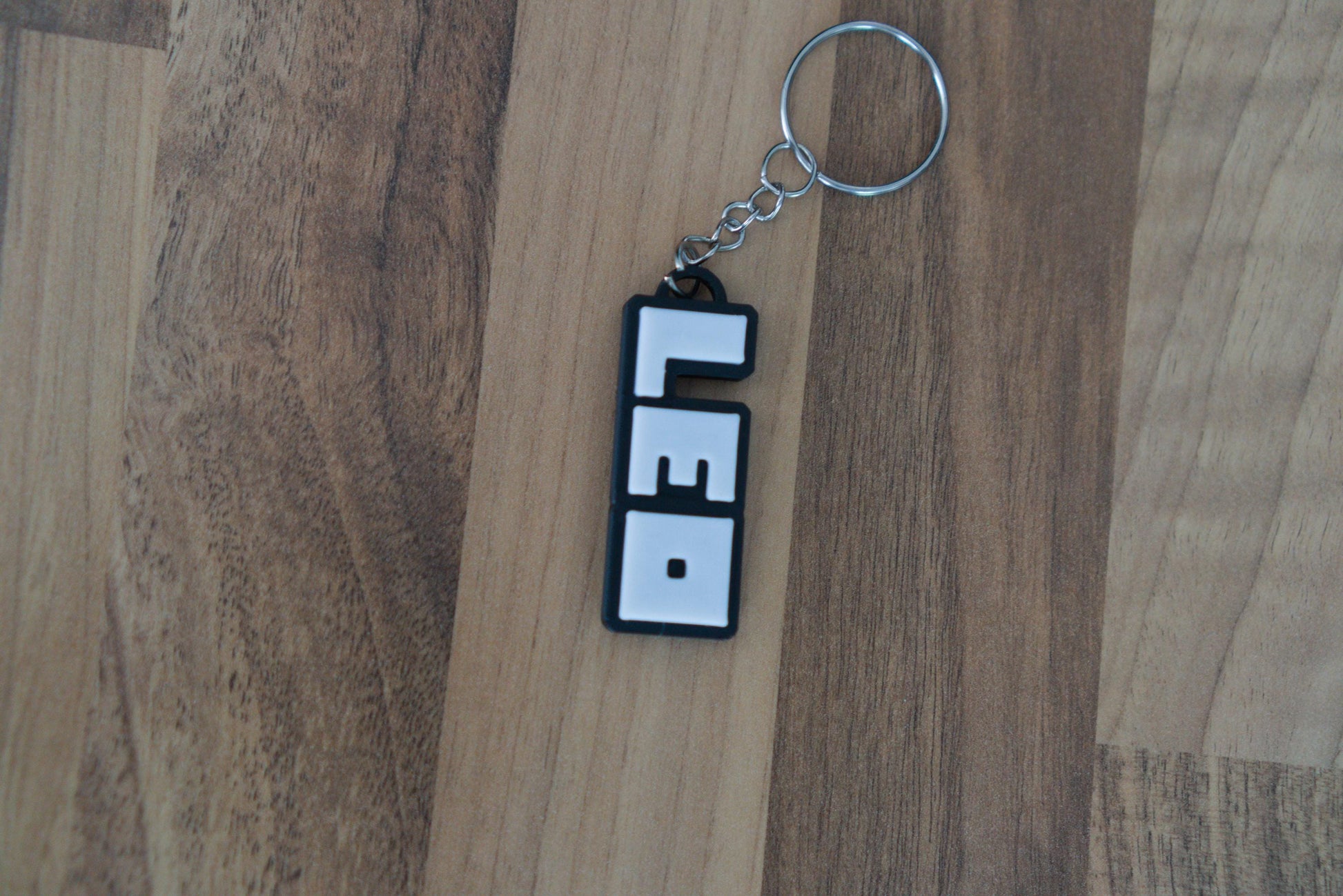 Roblox custom keychain side angle showing 3D print layers