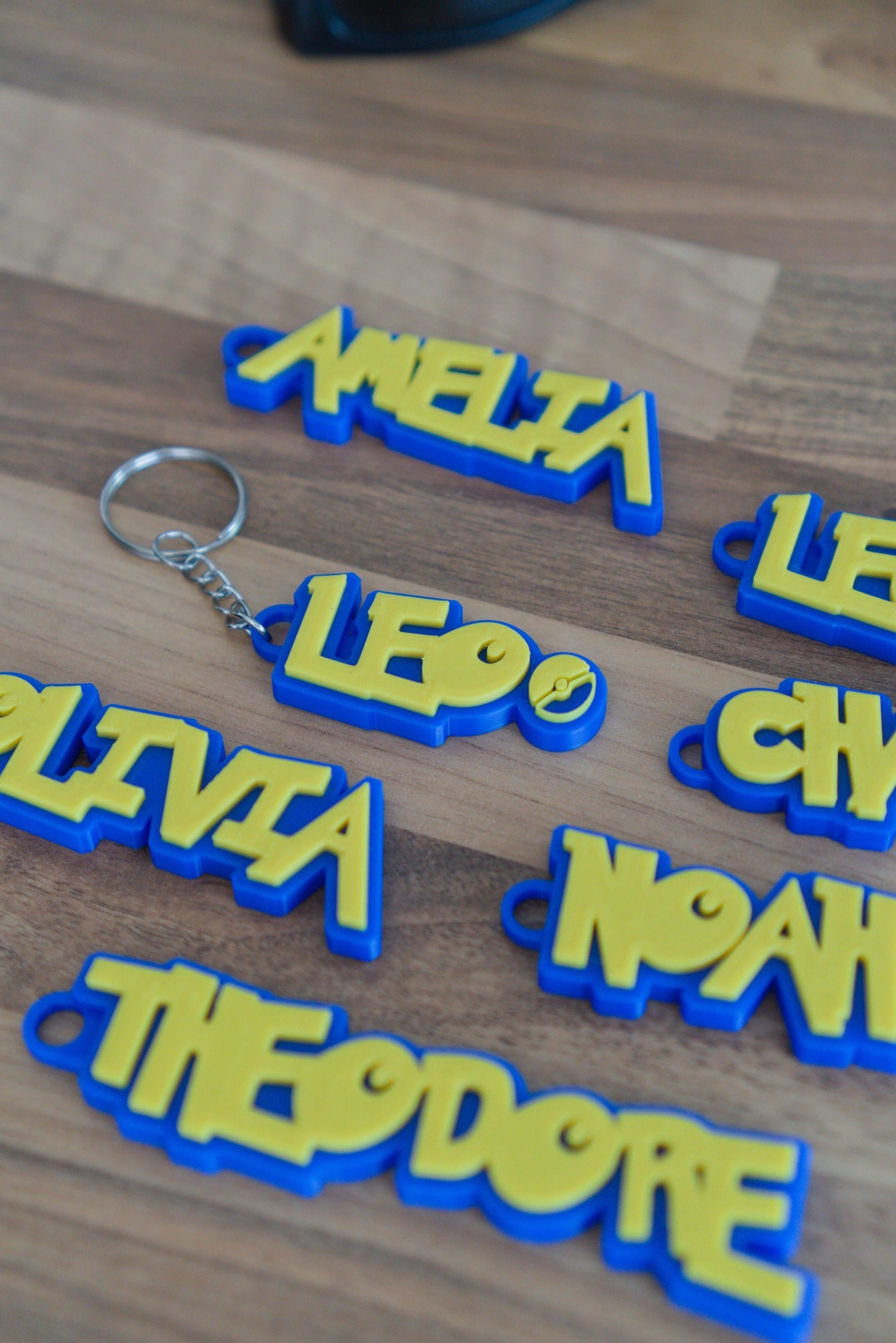 Custom Pokemon keychain on wooden background