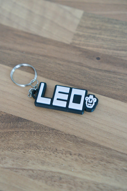 Personalised FNAF name keychain in black and white with Freddy character