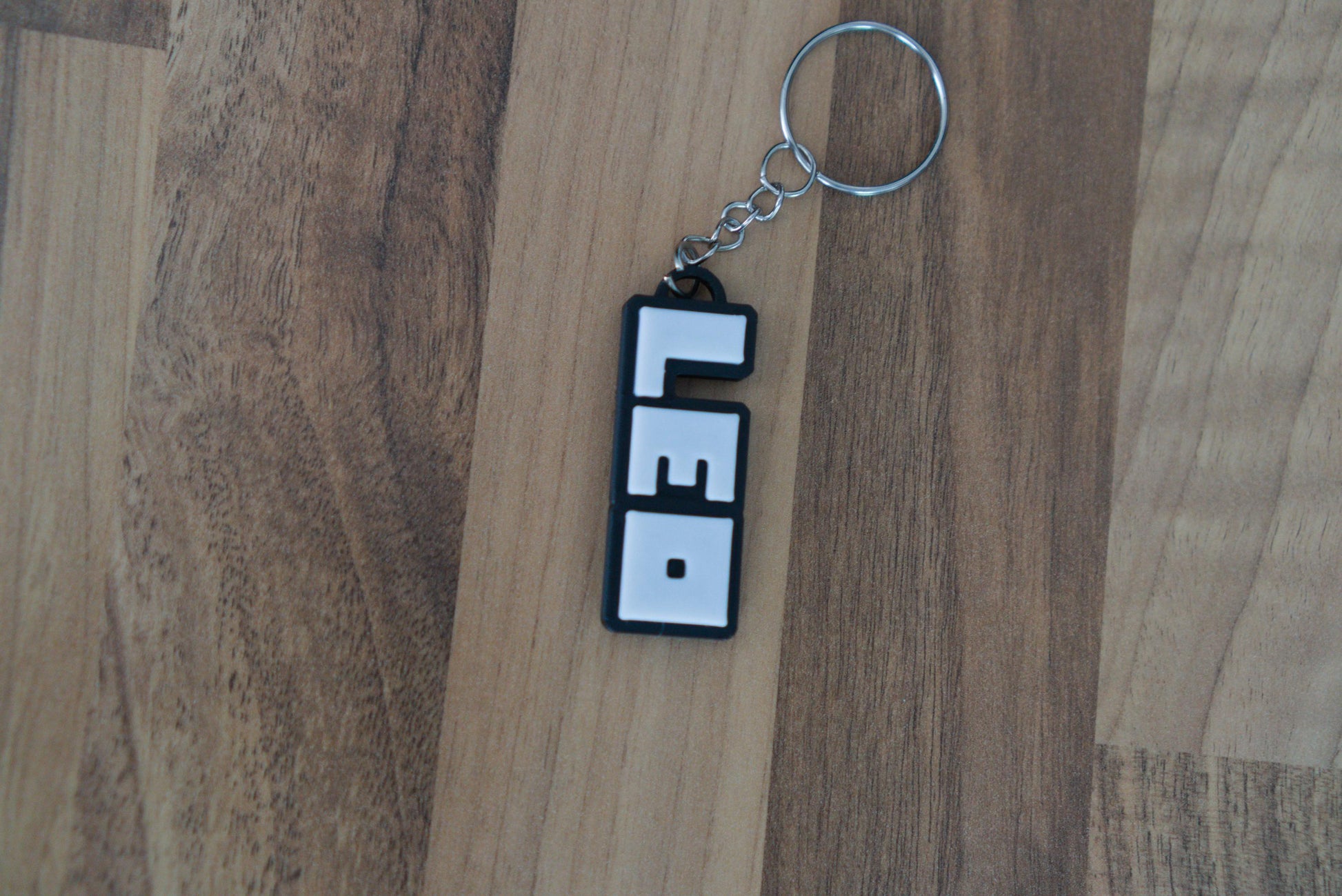 Roblox custom keychain side angle showing 3D print layers