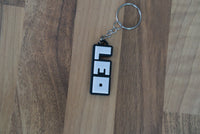 Roblox custom keychain side angle showing 3D print layers