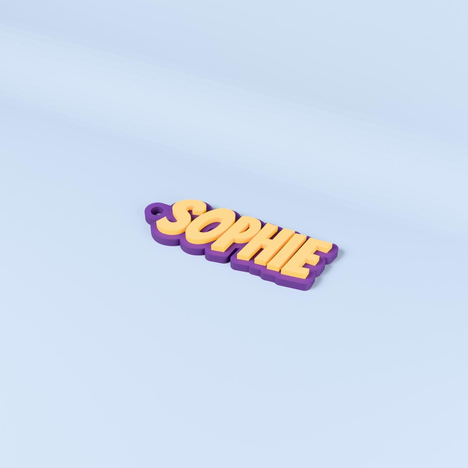 Sophie personalised name keyring in Bangers font with yellow raised text on an indigo purple base.