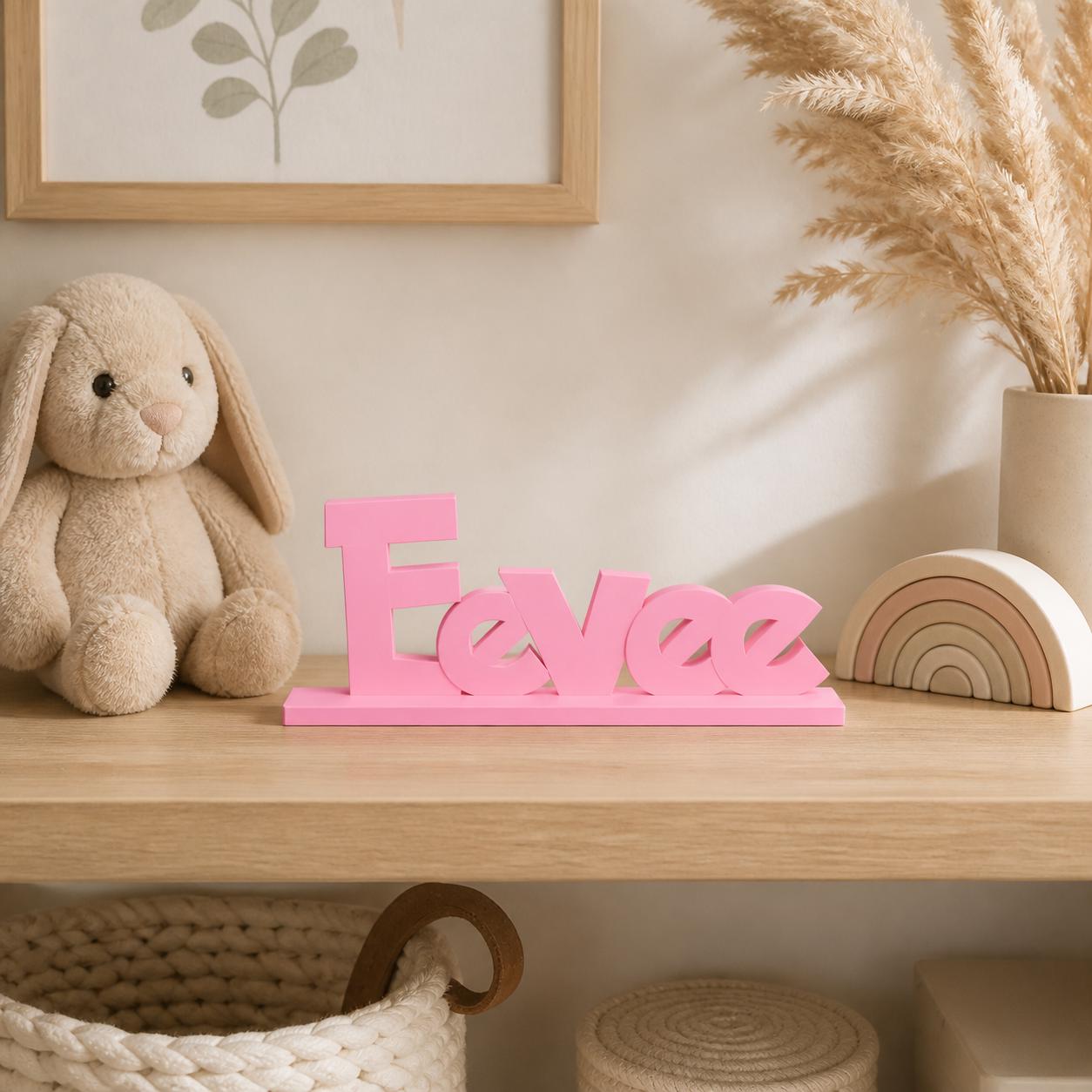 Eevee creature adventure personalised nameplate displayed on a warm neutral nursery shelf.