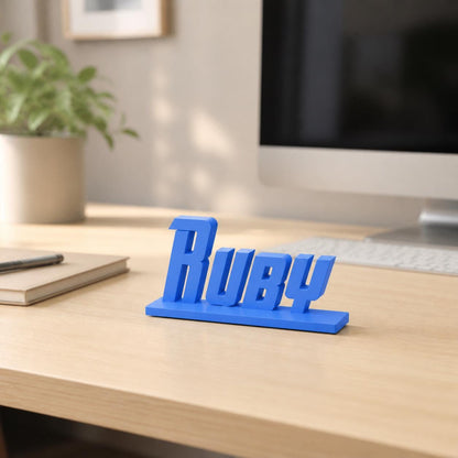 Ruby heroic angular personalised nameplate displayed on a modern home-office desk.