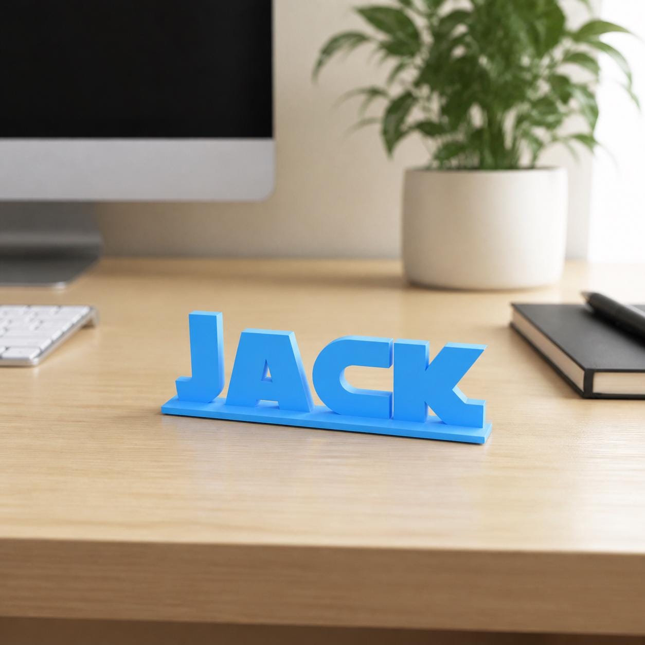 Jack geometric space personalised nameplate displayed on a modern home-office desk.