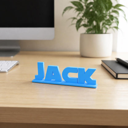 Jack geometric space personalised nameplate displayed on a modern home-office desk.