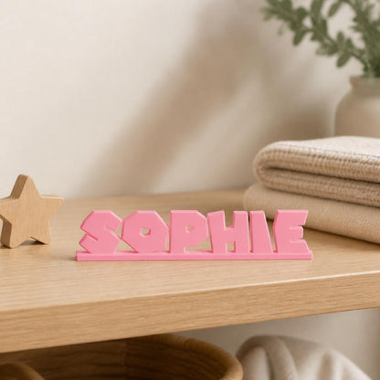 Sophie platform adventure personalised nameplate displayed on a warm neutral nursery shelf.