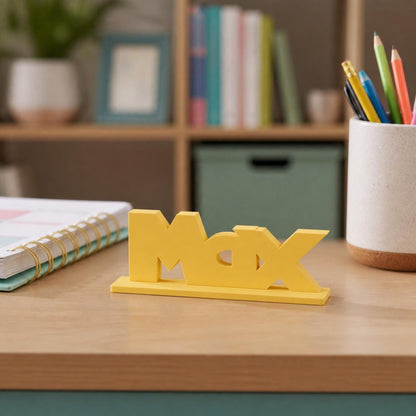 Max creature adventure personalised nameplate displayed on a teacher's desk.