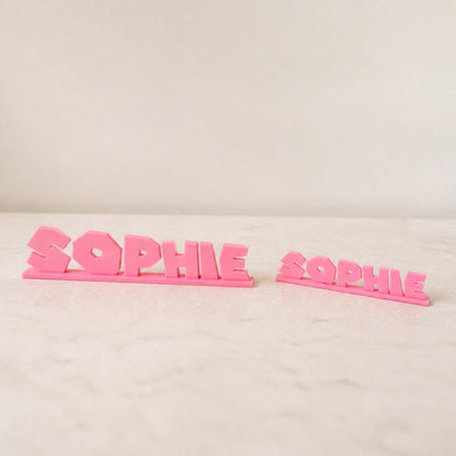 Small and Large Sophie platform adventure personalised nameplates shown together for size comparison.