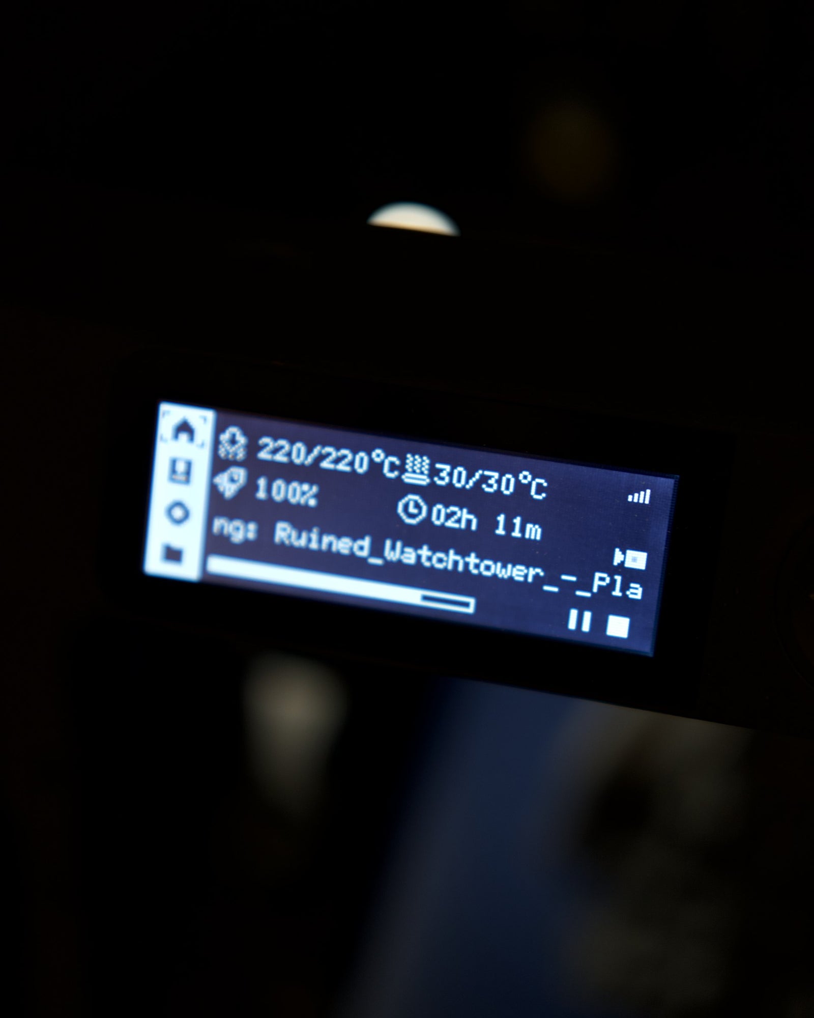 A printer display reading Ruined Watchtower with two hours eleven minutes remaining