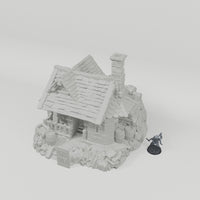 Owl Manor turntable with dark grey 28mm miniature for scale