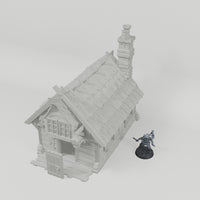 Cottage turntable with dark grey 28mm miniature for scale