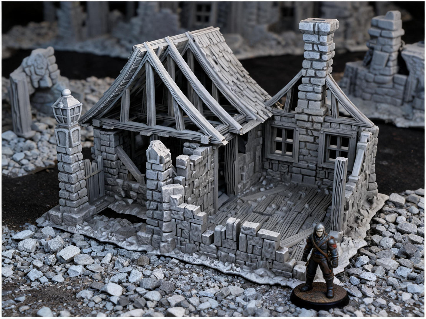 Unpainted Ruined House 28mm terrain with scale miniatures shown for context; miniatures not included