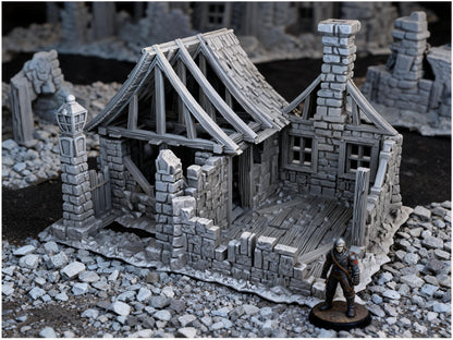 Unpainted Ruined House 28mm terrain with scale miniatures shown for context; miniatures not included