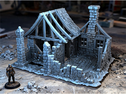 Unpainted Ruined House 28mm terrain with scale miniatures shown for context; miniatures not included